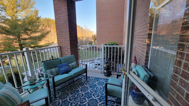 view of community featuring a yard and a patio