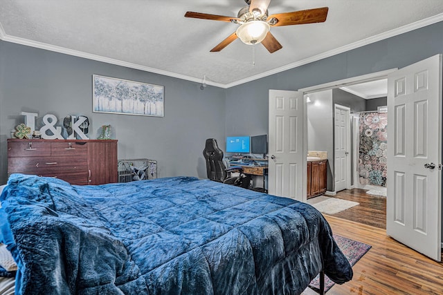 bedroom with crown molding, a ceiling fan, and wood finished floors