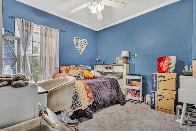 bedroom with ceiling fan, carpet, and ornamental molding