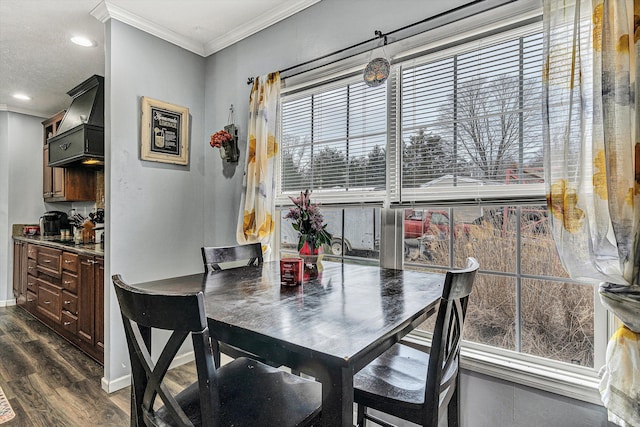 dining space with recessed lighting, baseboards, crown molding, and dark wood-type flooring