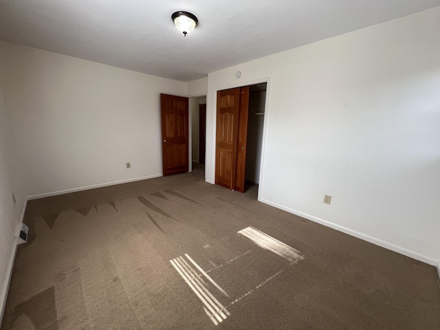 view of carpeted spare room