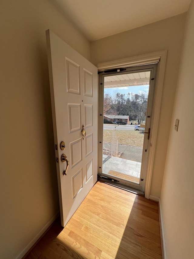 doorway featuring hardwood / wood-style flooring