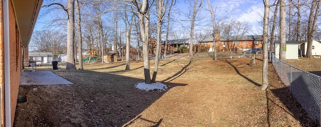 view of yard with a storage shed