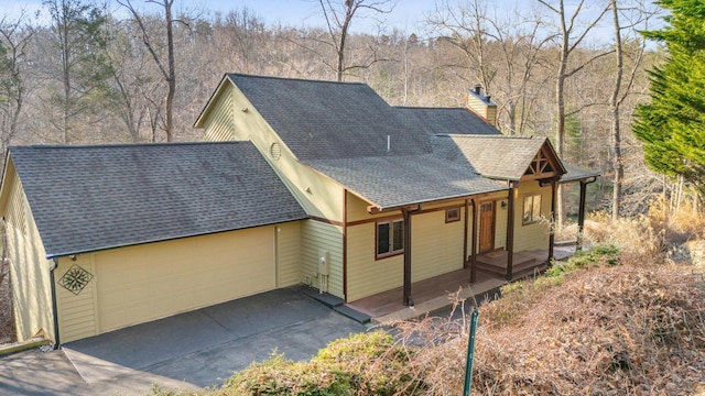 view of front of home featuring a garage and covered porch