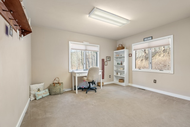 unfurnished office with light colored carpet