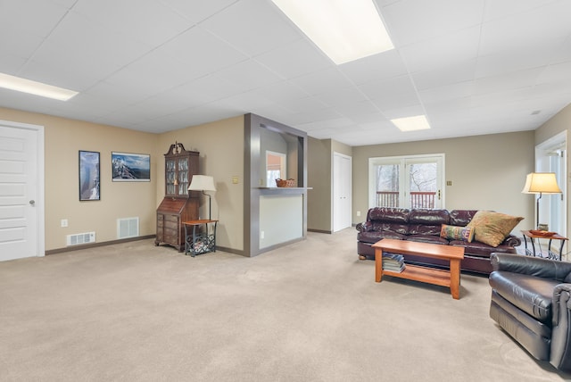 living room with light colored carpet