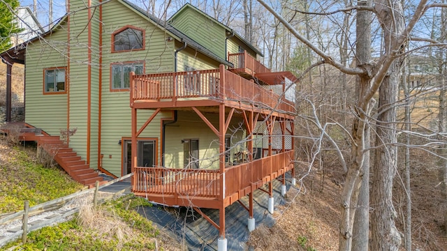 rear view of property with a deck