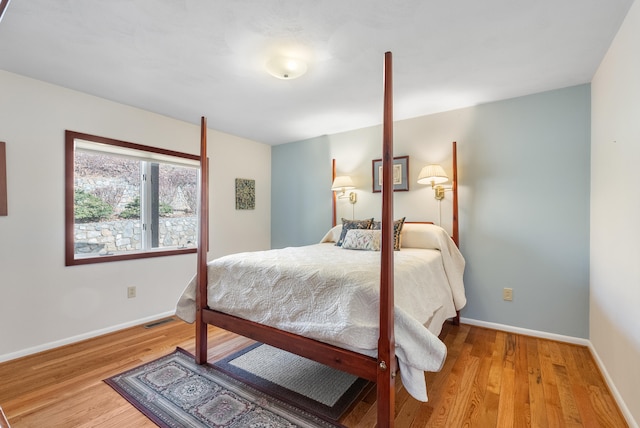 bedroom featuring wood-type flooring