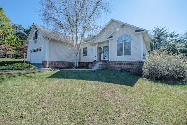 view of front of property featuring a garage and a front yard