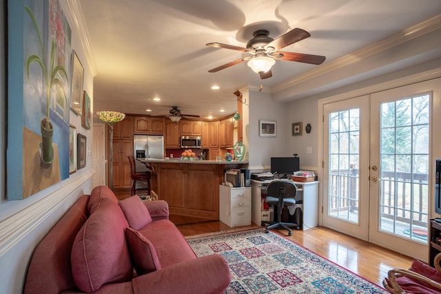 living area with crown molding, ceiling fan, light wood-type flooring, recessed lighting, and french doors