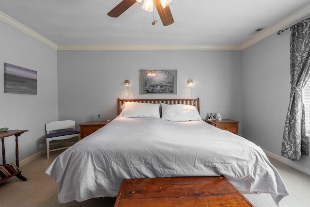 bedroom with visible vents, a ceiling fan, carpet floors, crown molding, and baseboards