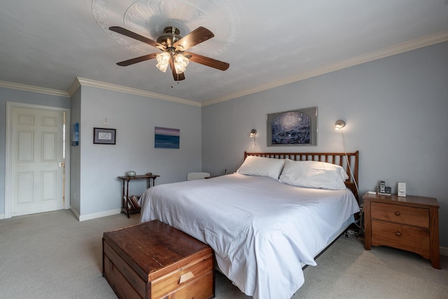 bedroom with a ceiling fan, light colored carpet, baseboards, and ornamental molding