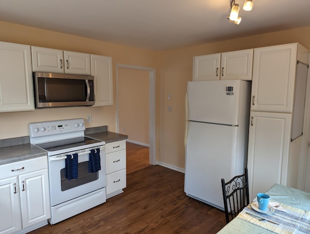 kitchen featuring white cabinetry, white appliances, and dark hardwood / wood-style flooring