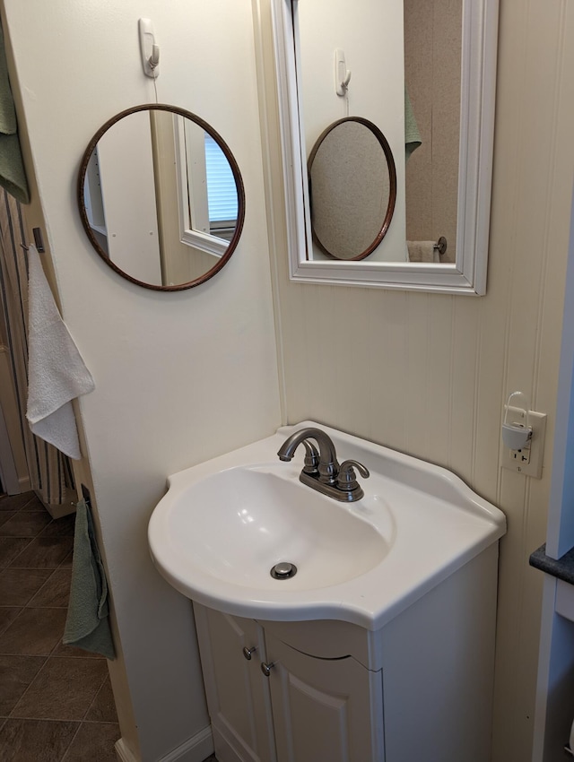 bathroom featuring vanity and tile patterned flooring