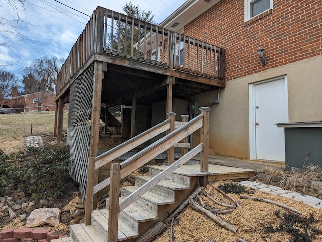 property entrance with a wooden deck