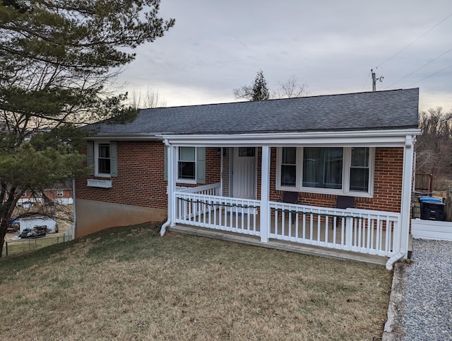 ranch-style house with a front lawn