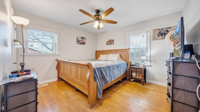 bedroom featuring wood-type flooring and ceiling fan