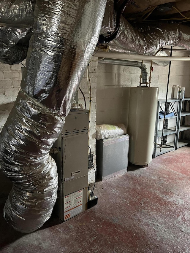 utility room featuring water heater