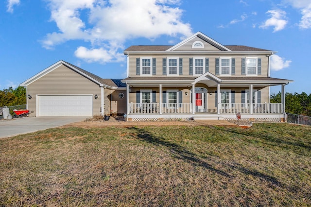 view of front of house featuring a garage, covered porch, and a front lawn