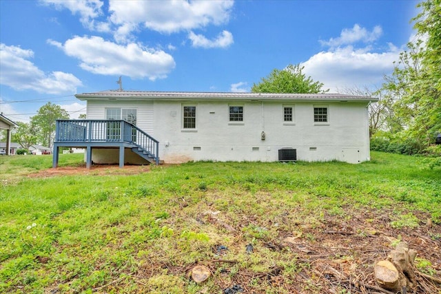 back of house featuring central AC, crawl space, stairs, and a deck