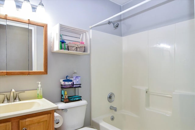 full bathroom featuring vanity, toilet, and shower / bath combination