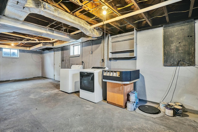 basement featuring washing machine and clothes dryer