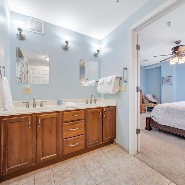 bathroom featuring vanity, tile patterned floors, and ceiling fan