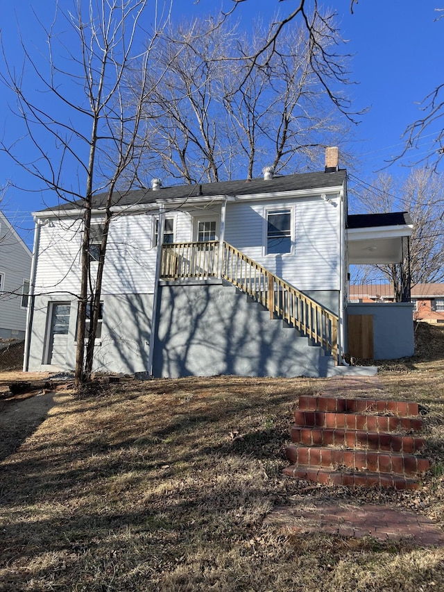 view of front of property with a wooden deck