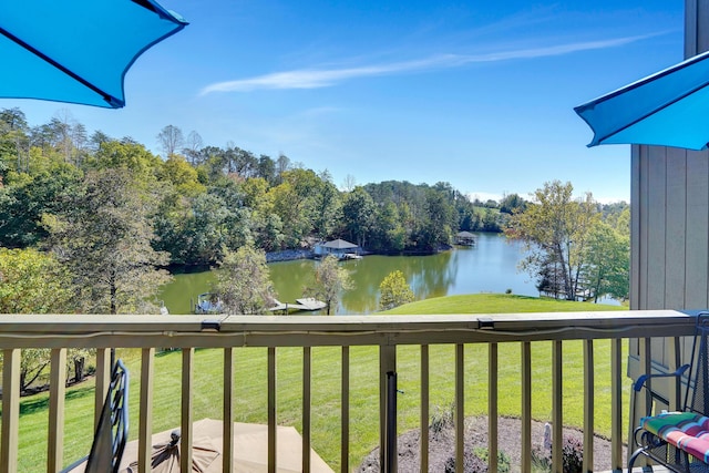 balcony featuring a water view