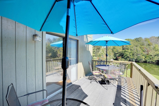 deck featuring a water view