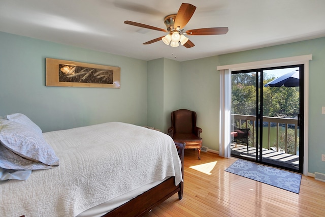 bedroom featuring access to exterior, light hardwood / wood-style flooring, and ceiling fan