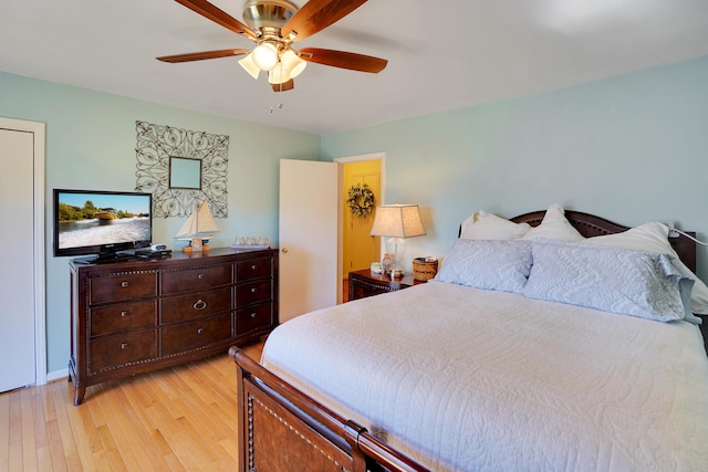 bedroom featuring light hardwood / wood-style floors and ceiling fan