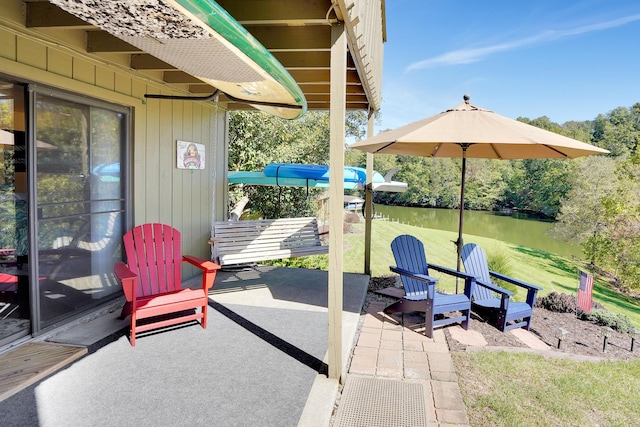 view of patio / terrace featuring a water view