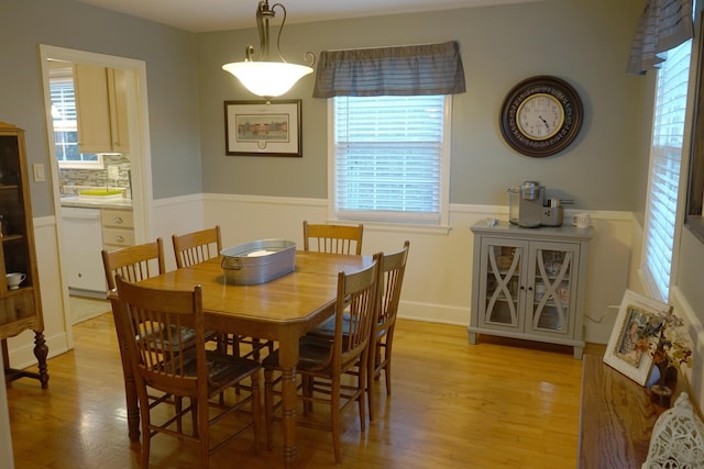 dining space featuring light hardwood / wood-style flooring