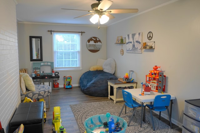 bedroom featuring crown molding, ceiling fan, and hardwood / wood-style flooring