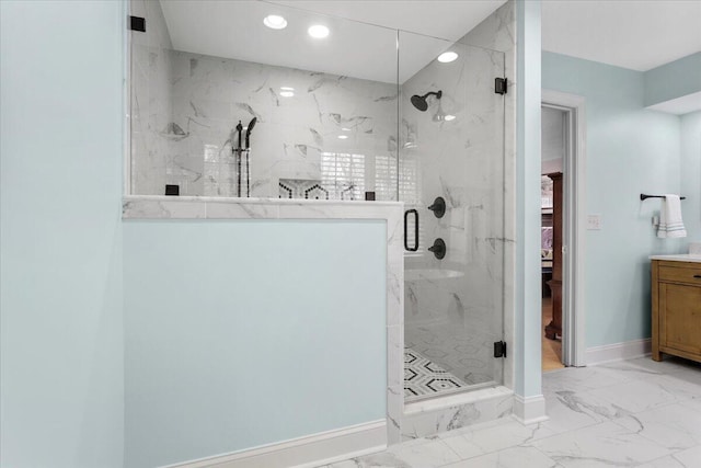 bathroom featuring vanity and walk in shower