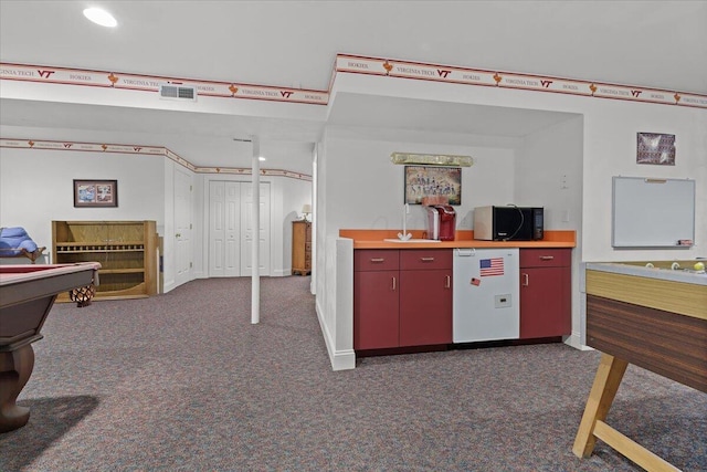 kitchen with dark colored carpet