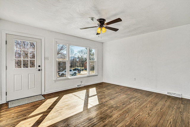 entryway with ceiling fan and dark hardwood / wood-style floors