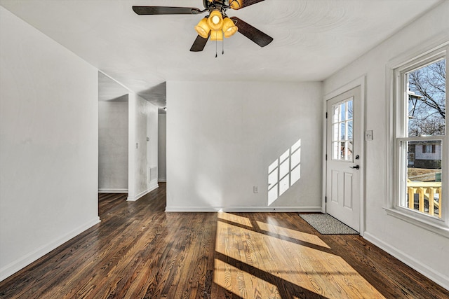 entrance foyer with ceiling fan and dark hardwood / wood-style flooring