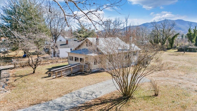 exterior space featuring a mountain view