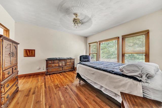 bedroom featuring hardwood / wood-style floors