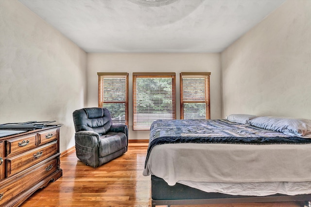 bedroom featuring light wood-type flooring