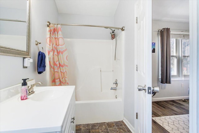 bathroom with shower / tub combo, vanity, and hardwood / wood-style floors