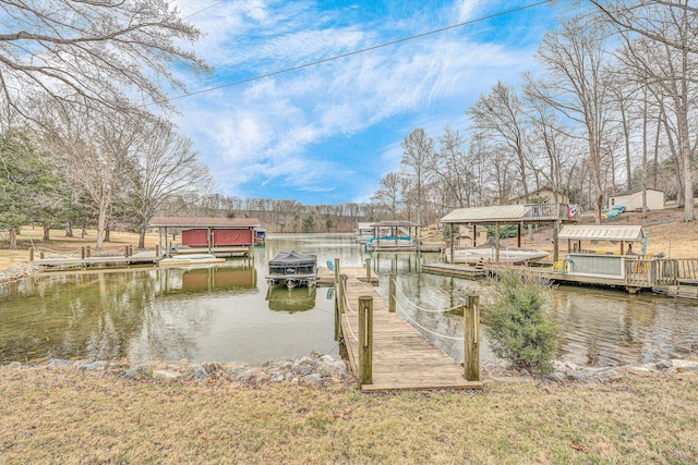 dock area featuring a water view