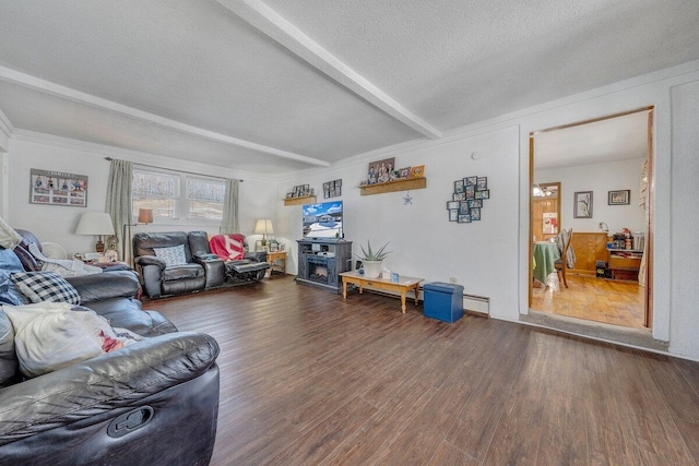 living room with a textured ceiling, beamed ceiling, dark wood-style flooring, and a fireplace