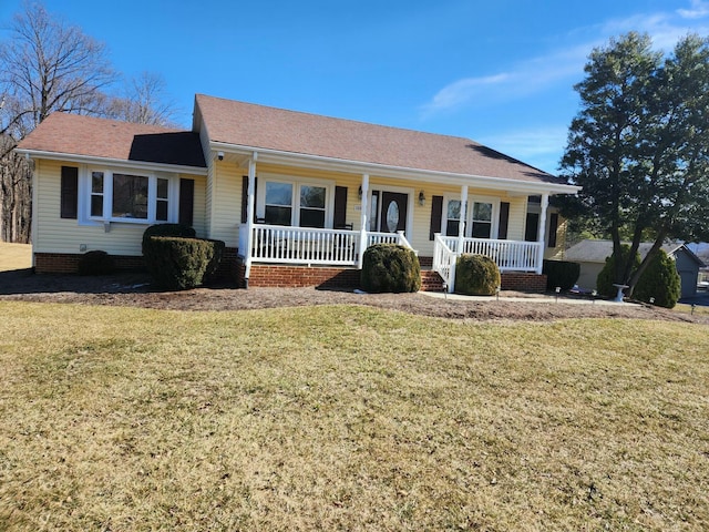 single story home featuring a porch and a front yard