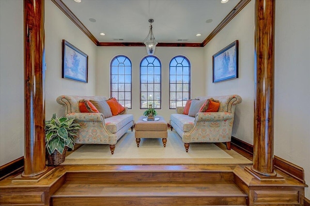 sitting room featuring ornamental molding