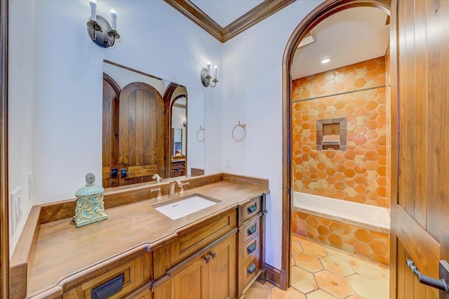 bathroom with vanity, ornamental molding, and plus walk in shower