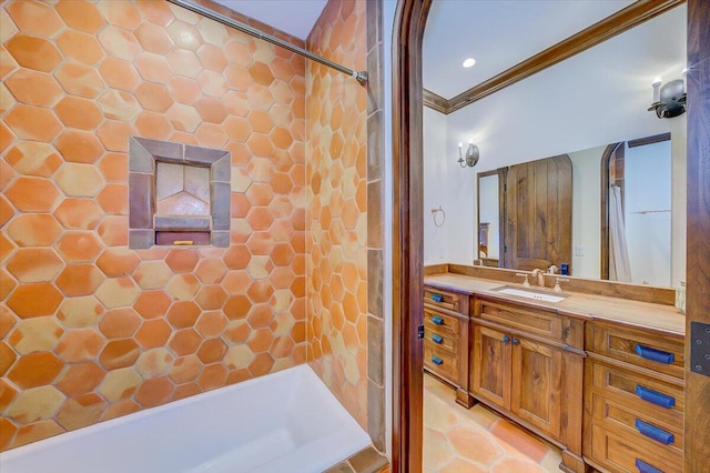 bathroom featuring crown molding, vanity, and shower with separate bathtub