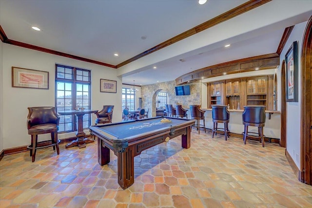 rec room with bar, crown molding, and pool table